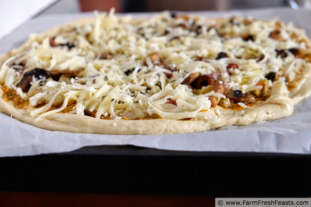 Fresh Tomato Pesto with Mushroom, Olive, Artichoke and Feta Pizza  | Farm Fresh Feasts