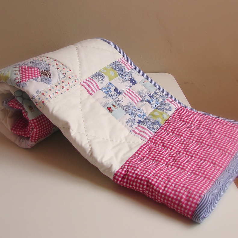 Roxy Creations Red blue and green cot quilt