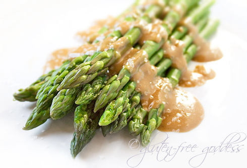 Asparagus with maple tahini dressing and sea salt Vegan asparagus with tahini maple dressing is a lovely gluten free side dish
