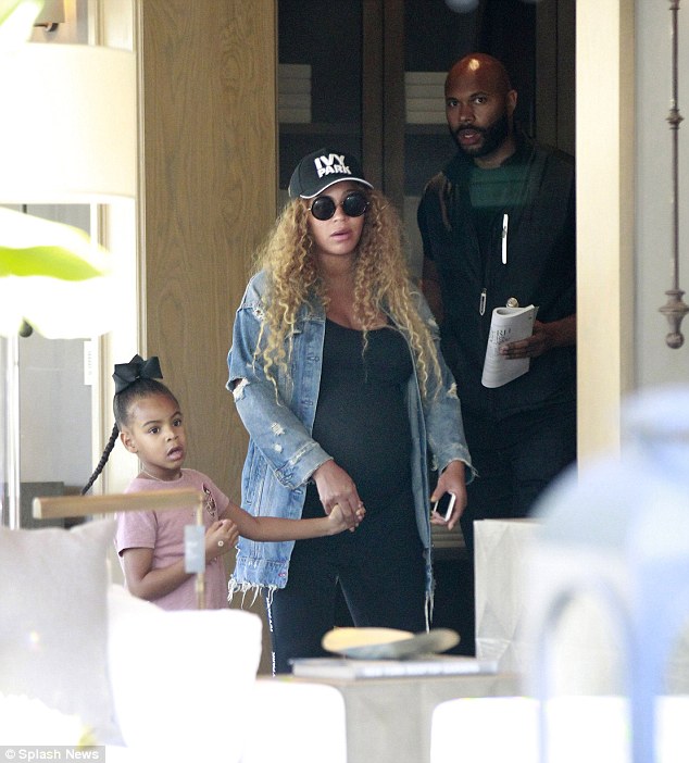 Latest Updates Pregnant Beyonce goes shopping with Blue Ivy