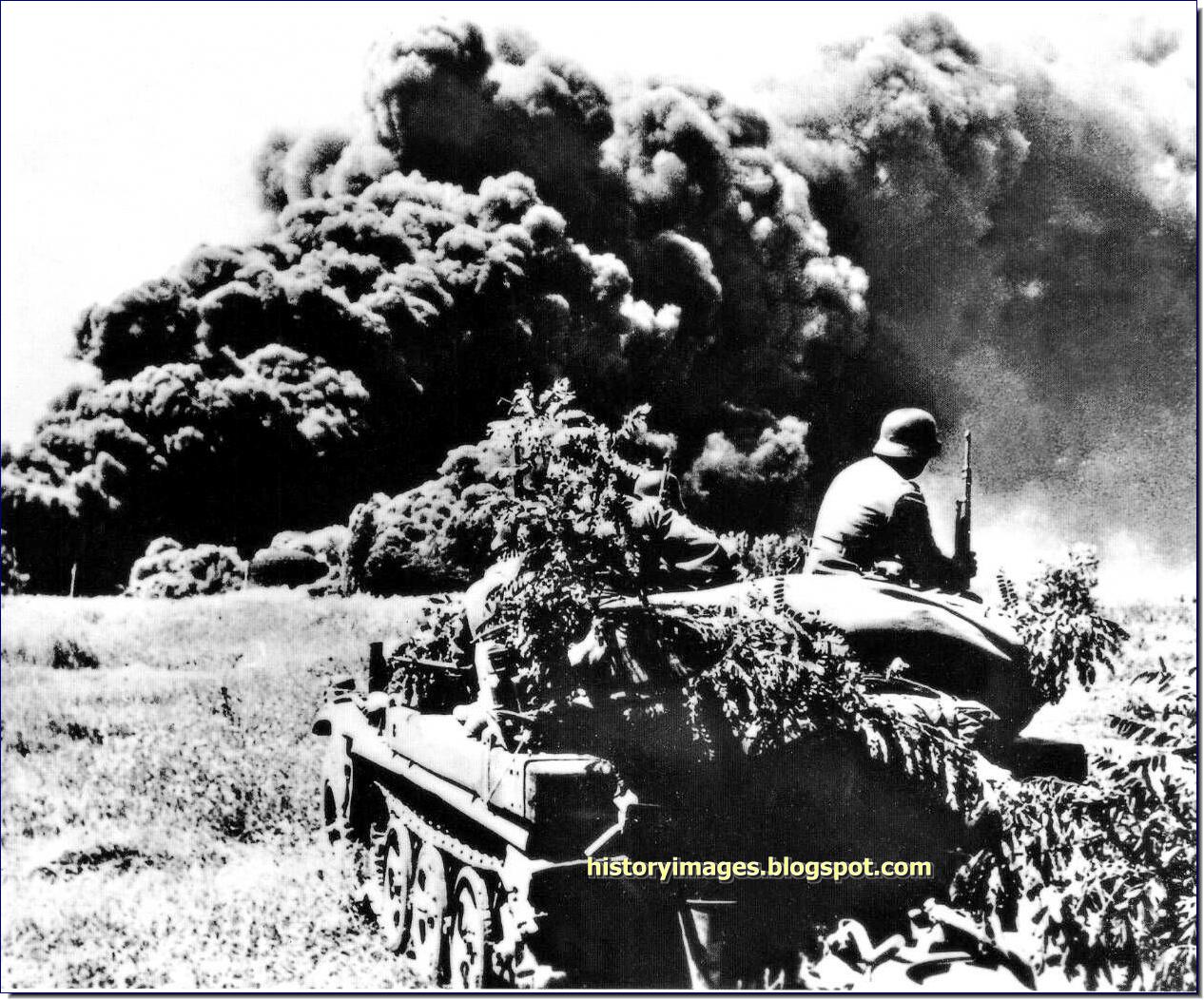germans-attack-caucasus-1941-1943-german-soldiers-watch-burning-oil-wlls-maykop-1942.jpg