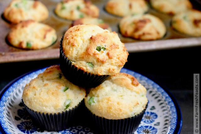 photo of a plate of savory asparagus goat cheese muffins