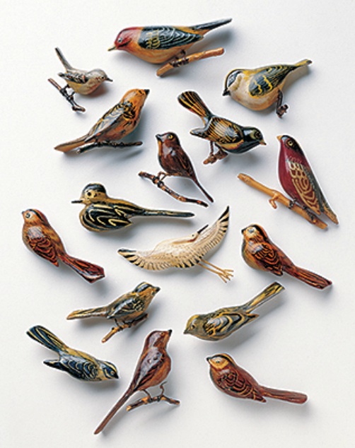 Bird broaches carved from scrap wood by Japanese-American internees during WW2