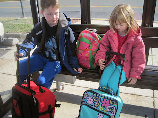 Children with suitcases