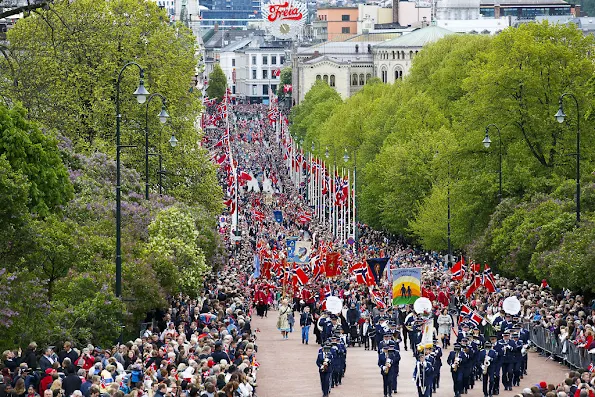 King Harald and Queen Sonja, Crown Prince Haakon of Norway and Crown Princess Mette-Marit of Norway with Princess Ingrid Alexandra, Prince Sverre Magnus and Marius Borg Høiby greet the Childrens Parade on the Skaugum Estate 