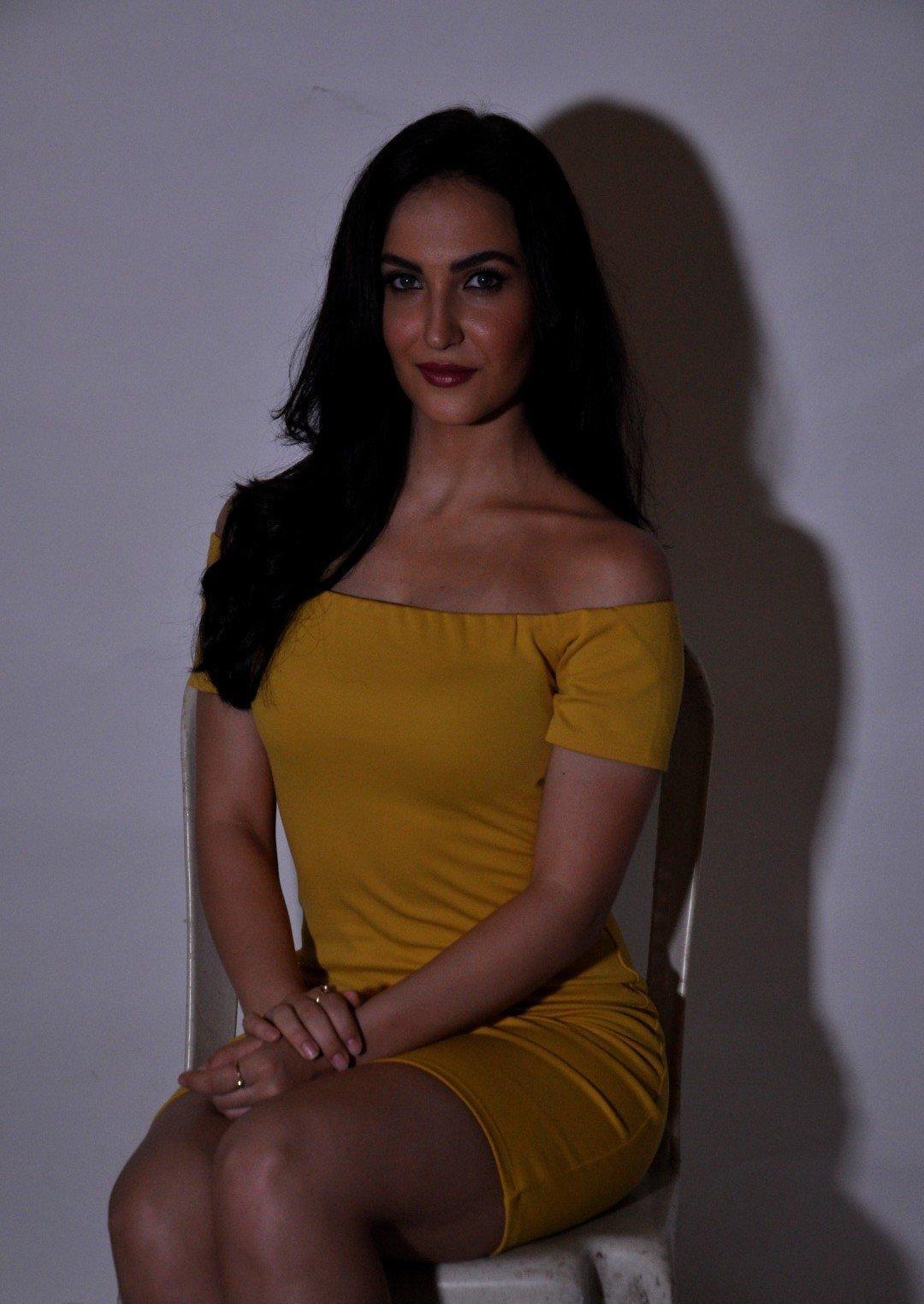 Elli Avram Looks Irresistibly Sexy In Yellow Skirt At Photo shoot By Ace Photographer Faizi Ali
