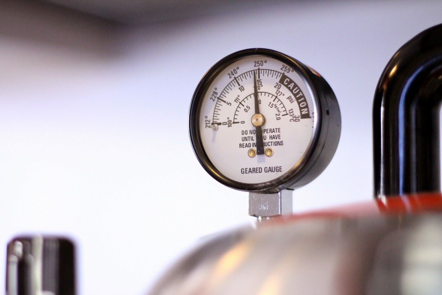 The pressure gauge, nearly to 15 PSI.