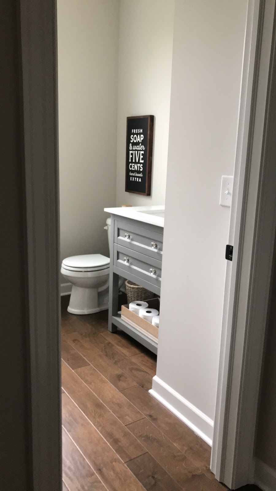 light gray vanity powder room 