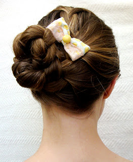 braided updo hair style with repurposed fabric bow in small
