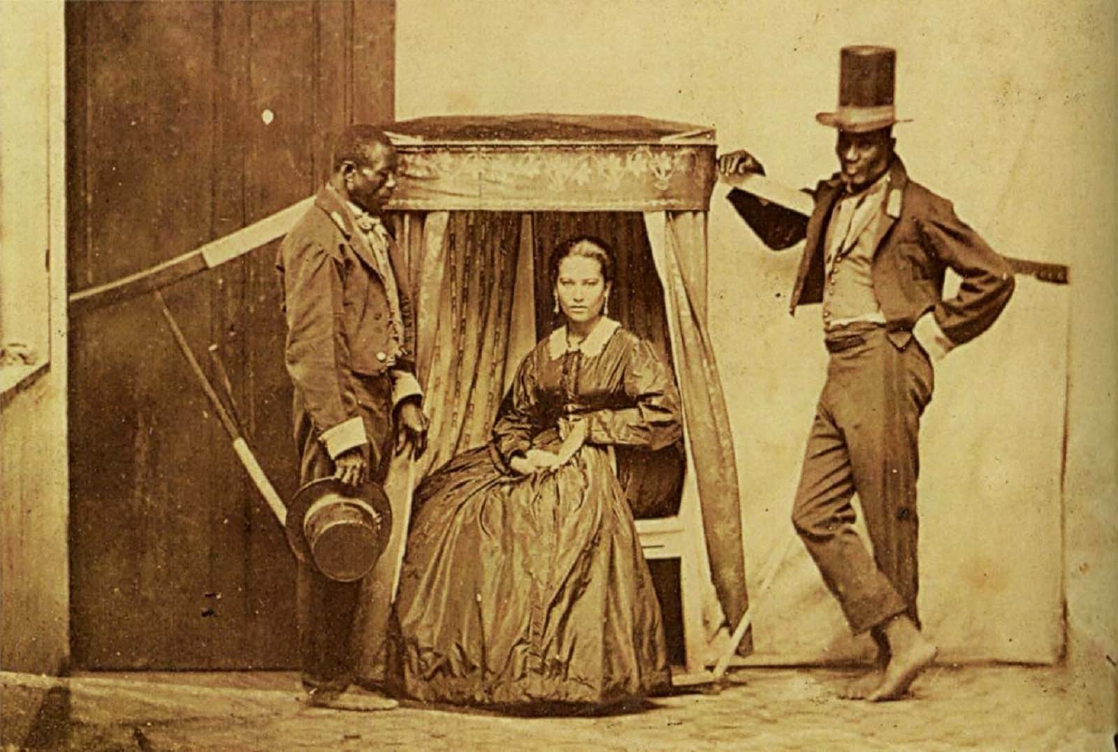 A lady with two slaves, in Bahia, Brazil, 1860.