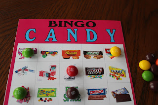 Celebrate with lots of candy at your Valentine, Candyland, or teen party with this Candy Bingo game printable.  A perfect way to add a little chocolate and candy love to your party with a fun bingo game.