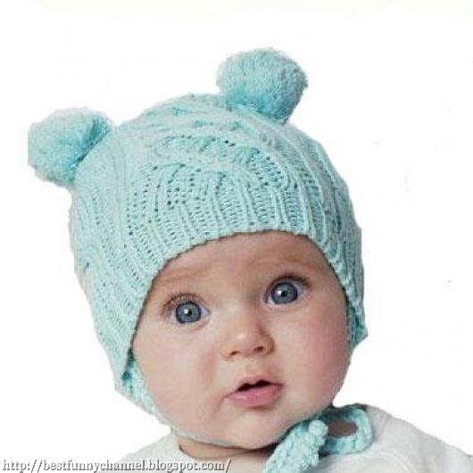 Funny baby in a cap with ears.