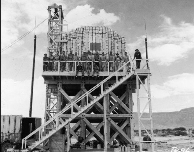 20 Shocking Pictures Of Hiroshima, The First City In History To Be Destroyed By An Atomic Bomb - Workers at Los Alamos posing with 100 tons of TNT.