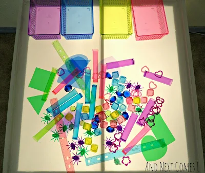 A simple color sorting activity for kids on the light table from And Next Comes L