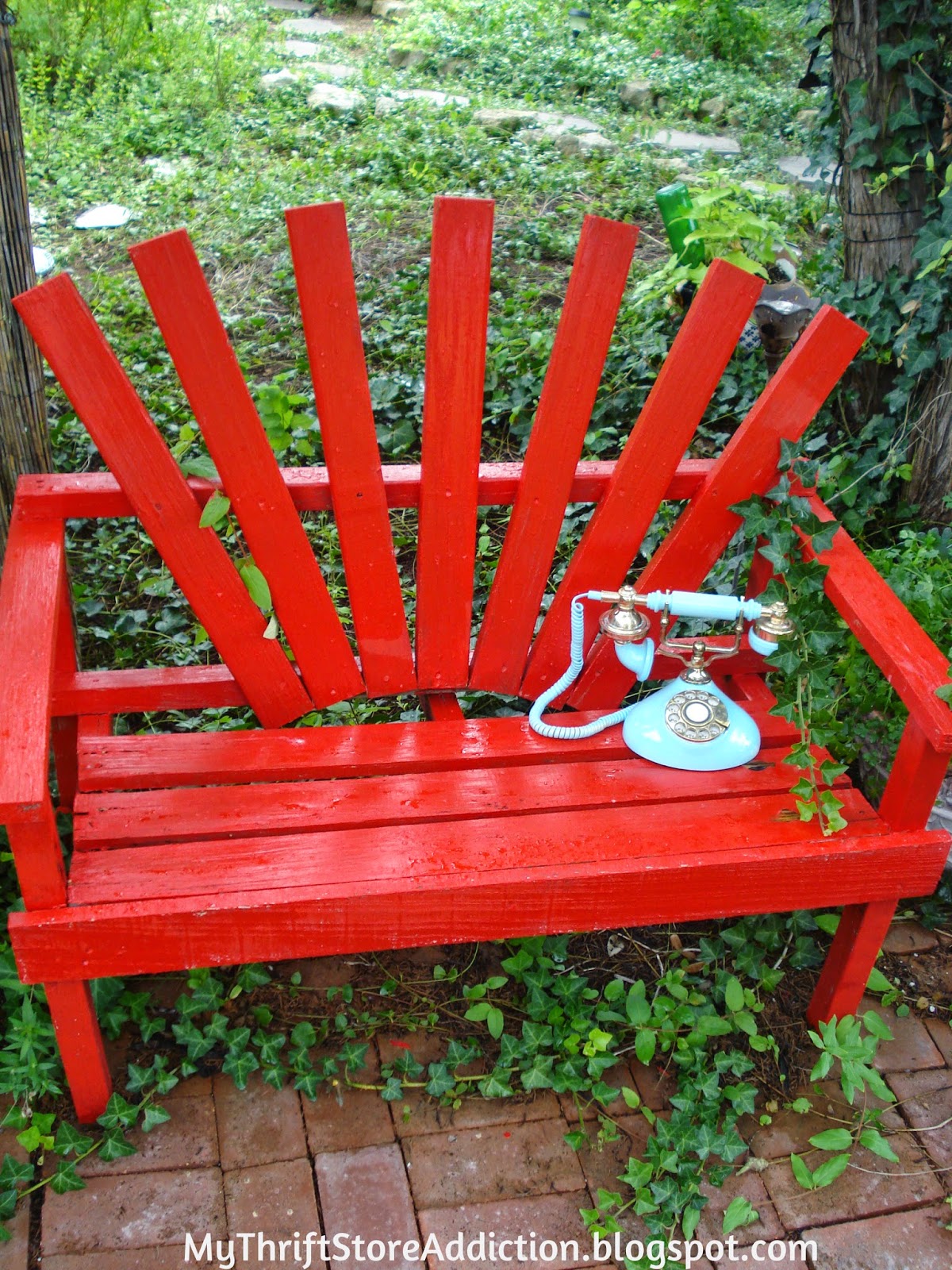 Red garden bench