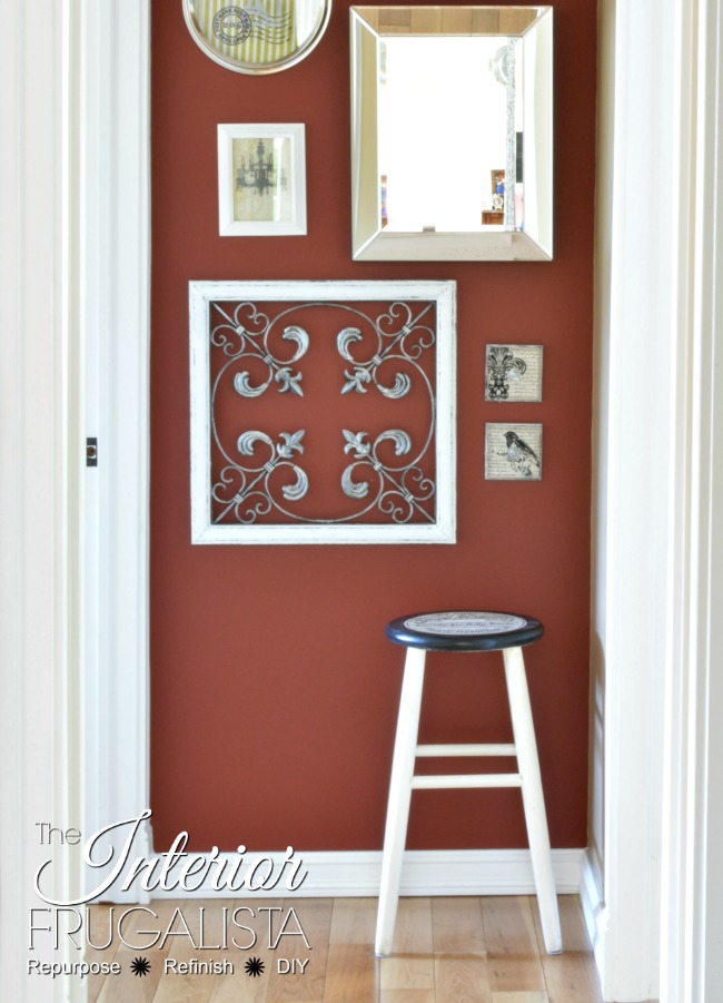 Mom's Stool Makeover against Gallery Wall