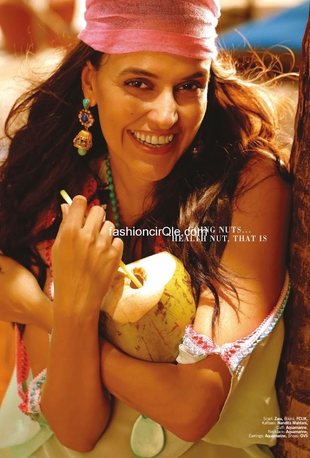 Neha dhupia reminds one of a tropical island with her bandana and the coconut - (2) - Neha Dhupia’s Filmfare – July 2012