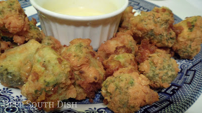 Broccoli florets dipped in batter and tossed in seasoned flour, then quickly deep fried - a crunchy on the outside, tender on the inside appetizer.