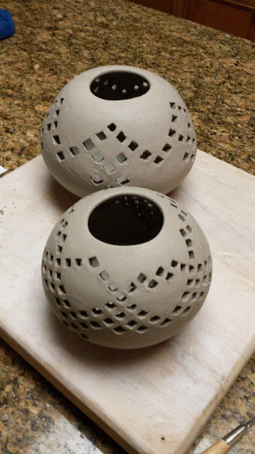 Pierced ceramic pottery spheres, in progress, inspired by Eric Stearns Pottery.