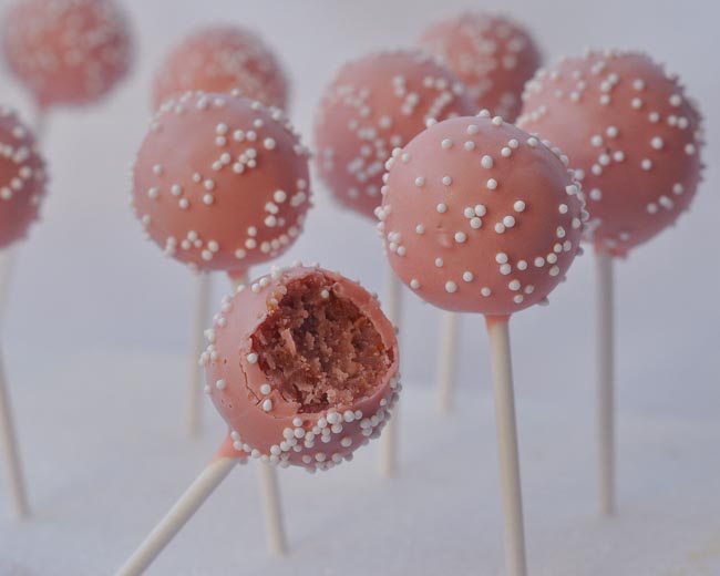 These cake pops would be perfect for a baby girl baby shower. They're ...