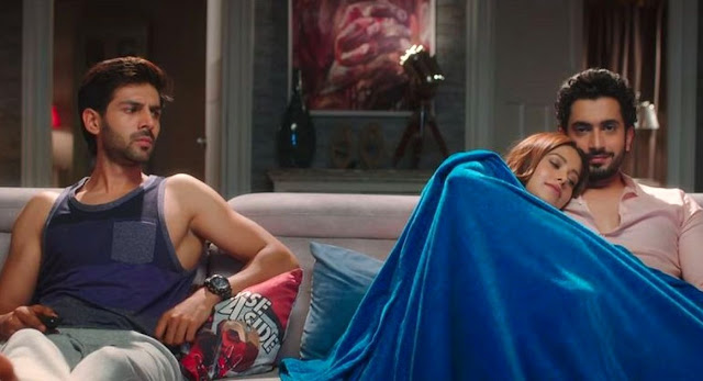 Kartik Aaryan, Sunny Singh, and Nushrat Bharucha in Sonu Ke Tittu Ki Sweety, getting cozy, cuddling on the couch