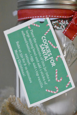 These sweet sugar jars are loaded with festive sprinkles that are ready to be baked into sugar cookies. They make great gifts for teachers, friends or the big man himself! printable tag telling how to bake the cookies