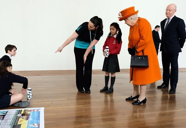 The Queen visited the Science Museum today celebrates the technology of communications. Style of the Queen