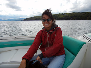 Me enjoying riding on a boat on one of the Finger Lakes in New York