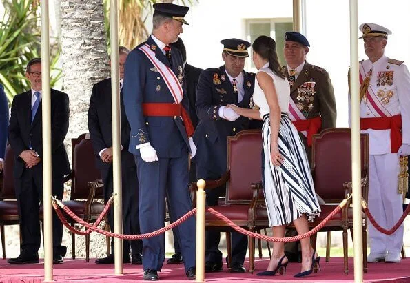 Queen Letizia wore Balenciaga Striped pleated crepe skirt and Carolina Herrera high heel slingback blue pumps