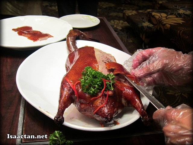 The cutting of the Peking Duck for us