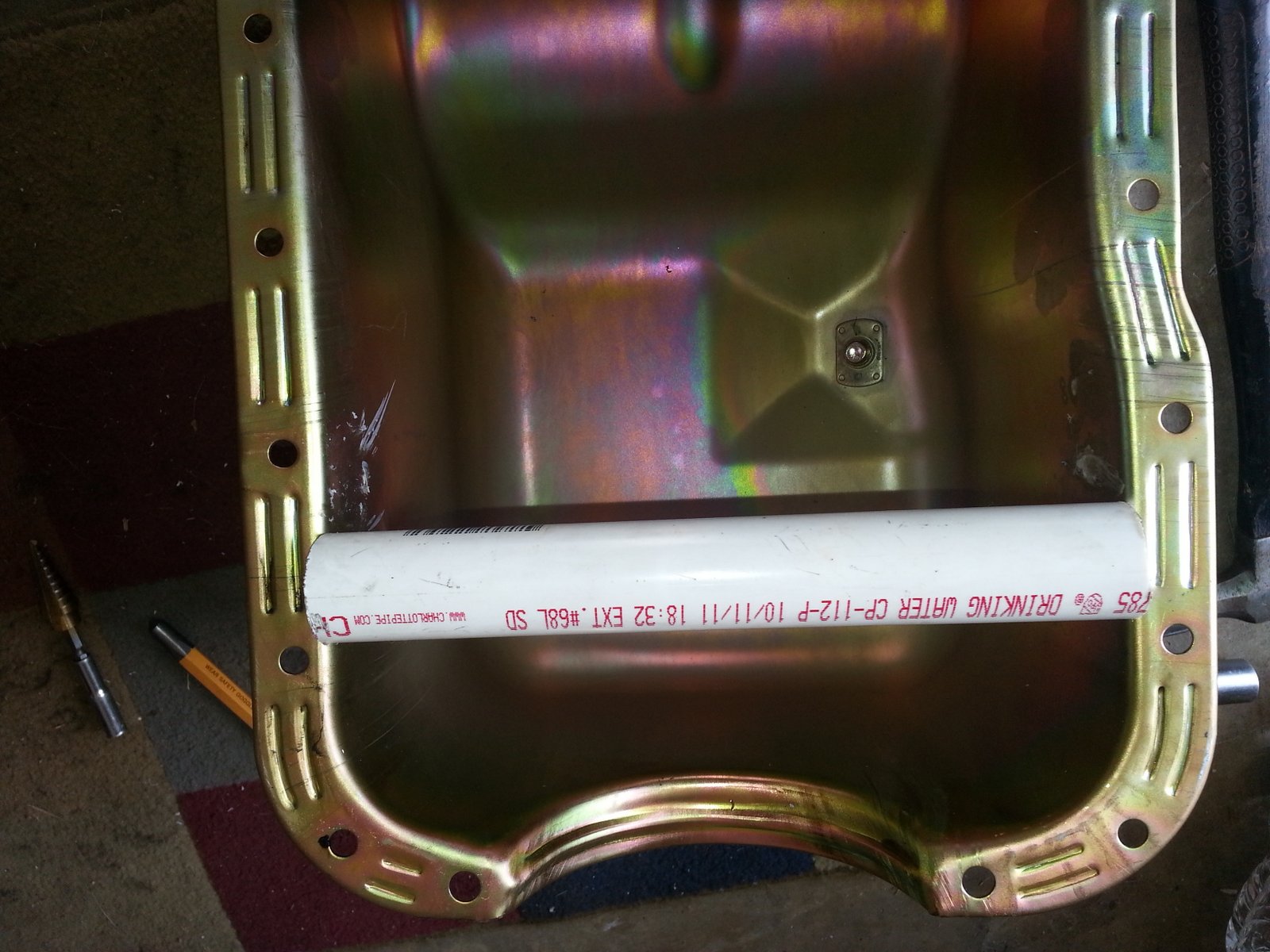 How to punch a hole in your oil pan for a Vortech Supercharger