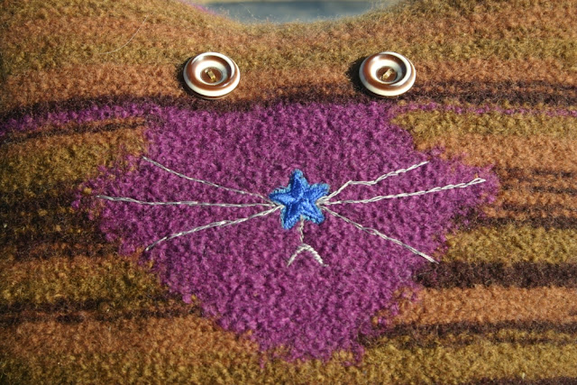 'Pussy Galore' Felted knit pillow of face detail