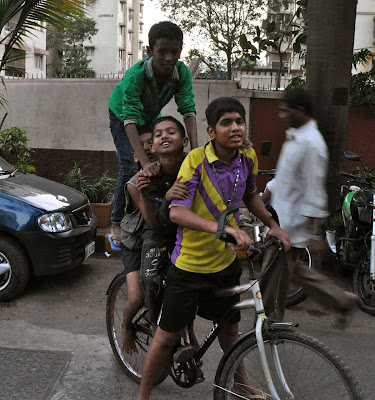 riding bicycles in India