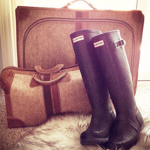 hunter wellies boots and vintage luggage