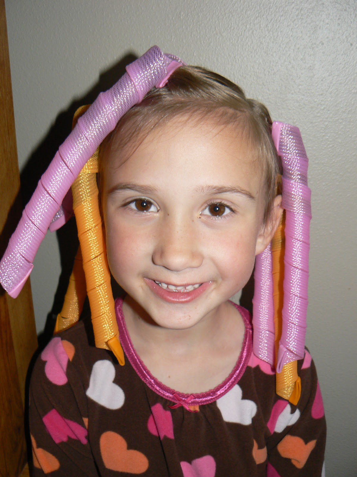 These curlers are quite a bit longer than her hair and I was surprised