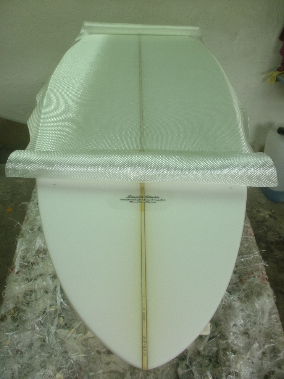 Organic Surf Liquid Glass surfboard glassing & repairsLaminação para