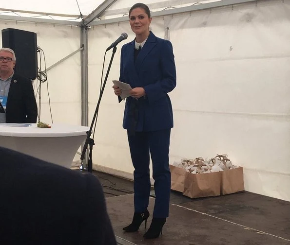 Crown Princess Victoria wore Af Klingberg Rakel Suede Nero Boots, Dagmar Taylor Tote Bag. Blue wool coat