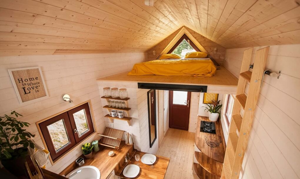03-Kitchen-and-Master-Bedroom-Baluchon-Multi-Level-Prefabricated-Tiny-House-on-Wheels-www-designstack-co