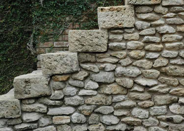 Reclaimed Stone Wall via Chateau Domingue as seen on linenandlavender.net