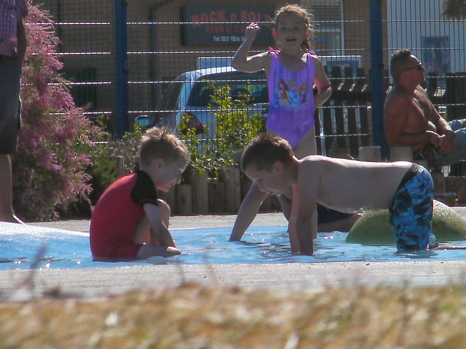 kids having fun in southsea splashpark child friendly splash zone near d-day museum, southsea esplanade