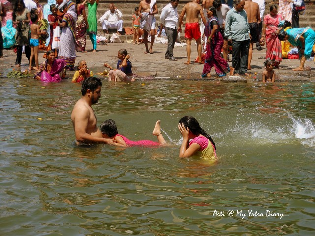 People bathing at Godavari River Ghat, Nashik