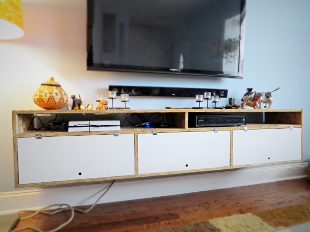 osb and fiber board floating tv console cabinet on wall