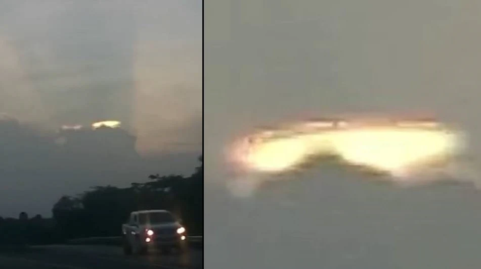 Flying Saucer becomes visible in the sky over Jamaica