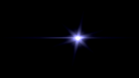 A light flare against a black background. Photo serves as link to the free lens flare effects page.