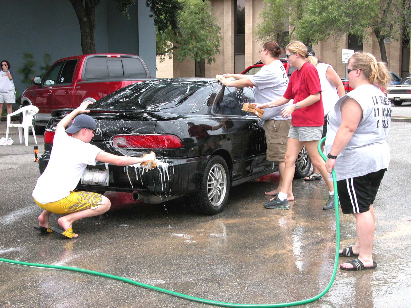 Women Who Play Football Paying the Bills Car Washes, Jello