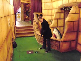 Emily at the indoor Magical Golf FX Adventure Golf course at Manning's Amusements in Felixstowe, Suffolk
