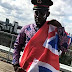 Adekunle Gold Turns African Priest In UK Shoot (Photos)