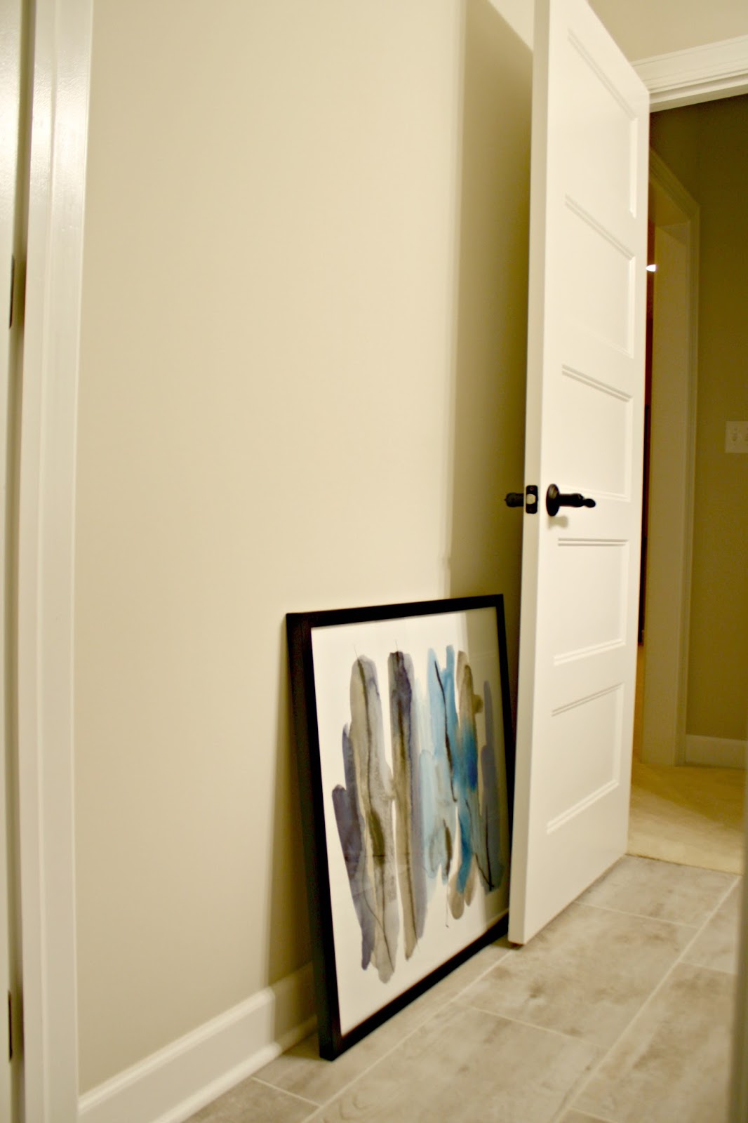 Where to hang art next to a door? Thrifty Decor Chick Thrifty DIY