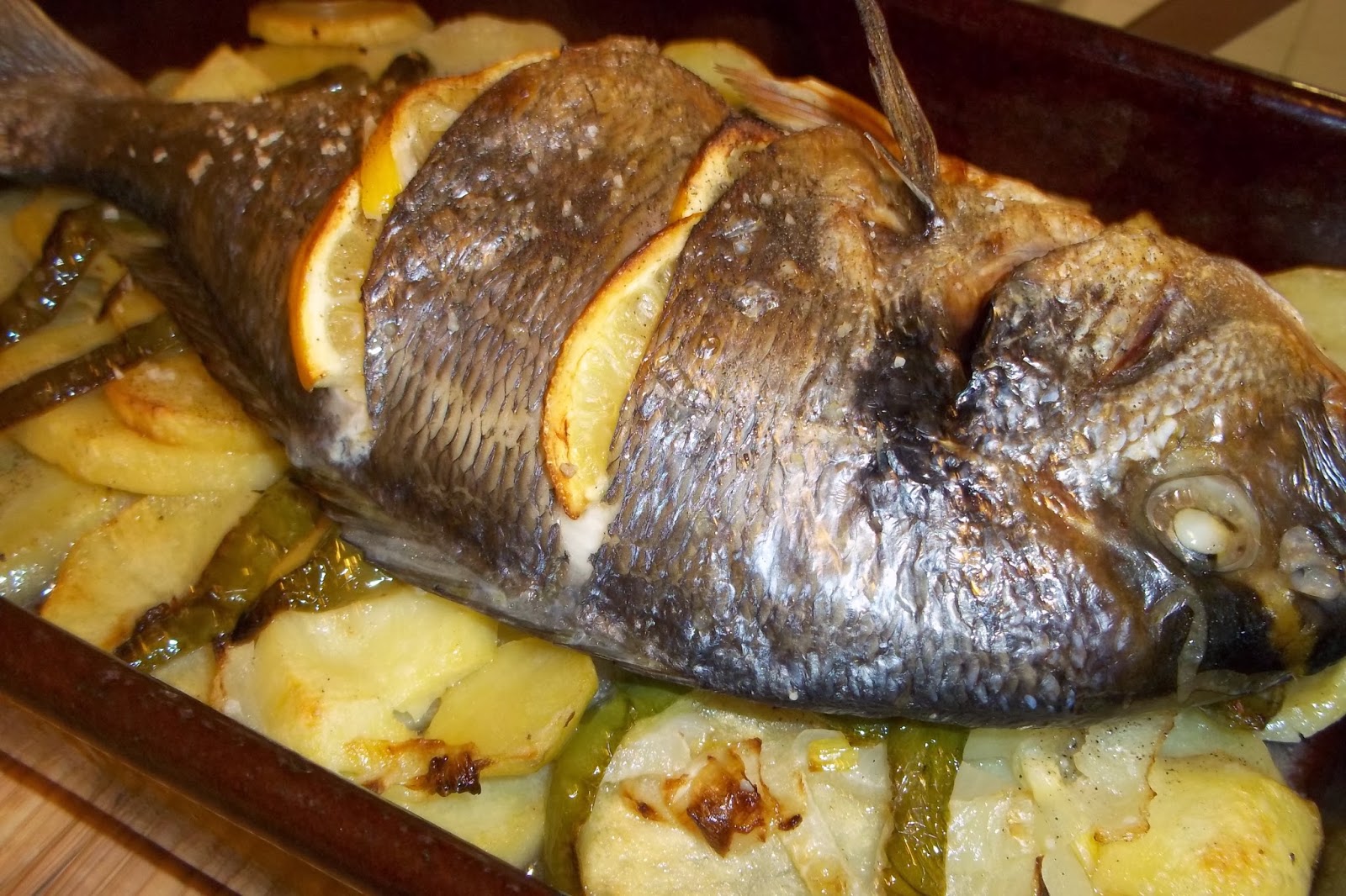 Dorada al horno con patatas Cocinar conCiencia