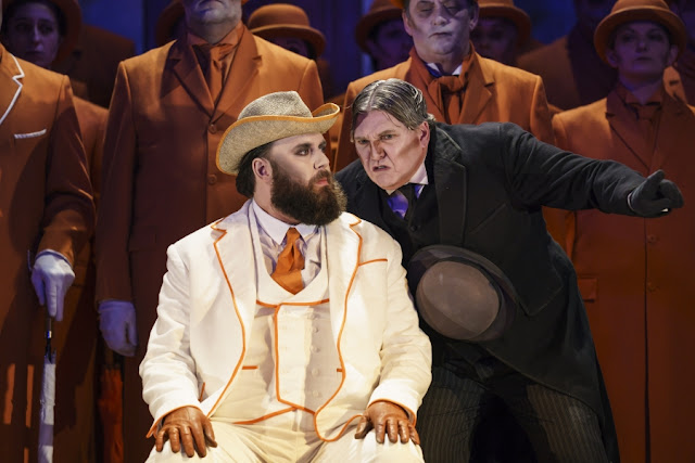 WNO The Magic Flute. Sarastro played by James Platt, Monostatos played by Howard Kirk